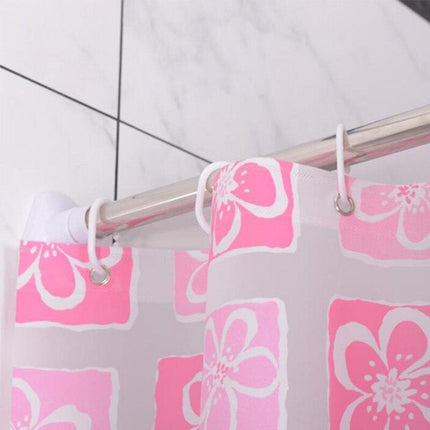 Lyserødt badeforhæng med blomstermønster