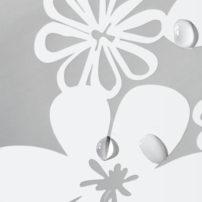 Semi-transparent badeforhæng med hvidt blomstermønster